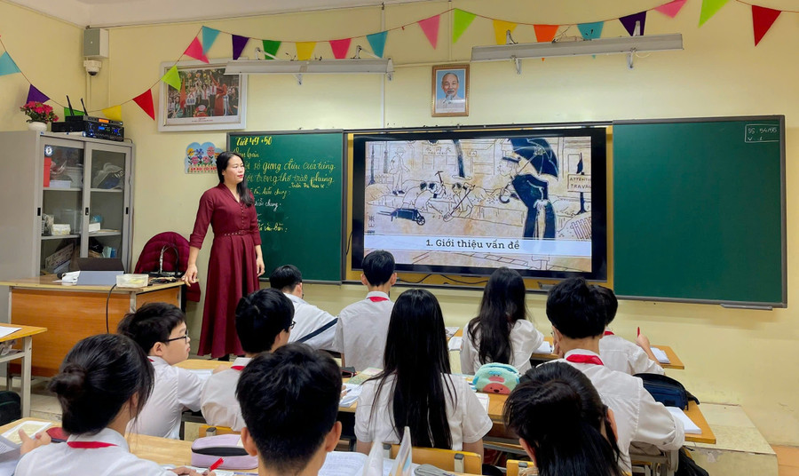 Giờ học tại Trường THCS Đống Đa (Kim Liên, Hà Nội). Ảnh: NTCC thong-nhat-bo-sach-giao-khoa-8447.jpg