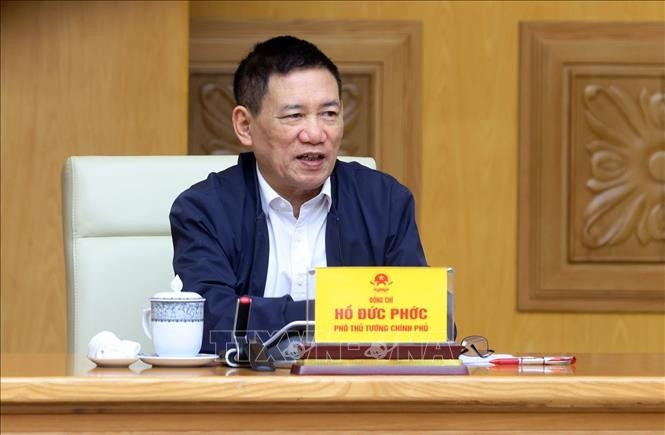 Phó Thủ tướng Hồ Đức Phớc phát biểu tại điểm cầu trụ sở Chính phủ. Ảnh: Phạm Kiên/TTXVN Phó Thủ tướng Hồ Đức Phớc phát biểu tại điểm cầu trụ sở Chính phủ. Ảnh: Phạm Kiên/TTXVN