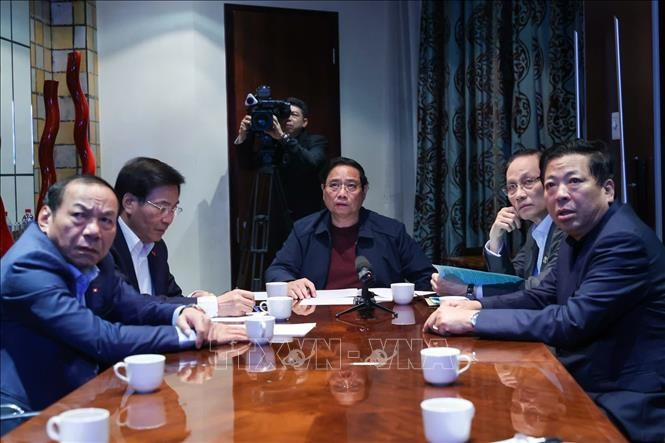 Thủ tướng Phạm Minh Chính chủ trì họp trực tuyến từ Nam Phi, chỉ đạo khắc phục hậu quả mưa lũ. Ảnh: Dương Giang/TTXVN Thủ tướng Phạm Minh Chính chủ trì họp trực tuyến từ Nam Phi, chỉ đạo khắc phục hậu quả mưa lũ. Ảnh: Dương Giang/TTXVN