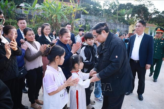 Thủ tướng Phạm Minh Chính thăm, chúc Tết nhân dân Khu tái định cư Đông Khê, Cao Bằng. Ảnh: Dương Giang/TTXVN Thủ tướng Phạm Minh Chính thăm, chúc Tết nhân dân Khu tái định cư Đông Khê, Cao Bằng. Ảnh: Dương Giang/TTXVN
