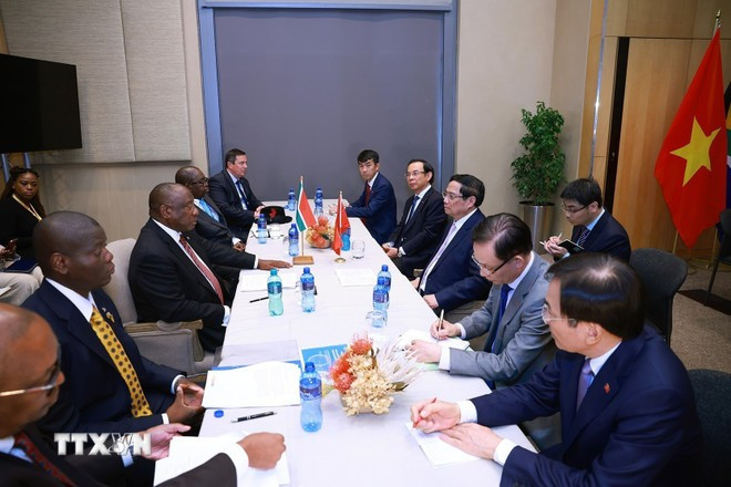 Thủ tướng Phạm Minh Chính hội kiến Tổng thống Cộng hòa Nam Phi, Chủ tịch G20 năm 2025, Matamela Cyril Ramaphosa. (Ảnh: Dương Giang/TTXVN) Thủ tướng Phạm Minh Chính hội kiến Tổng thống Cộng hòa Nam Phi, Chủ tịch G20 năm 2025, Matamela Cyril Ramaphosa. (Ảnh: Dương Giang/TTXVN)