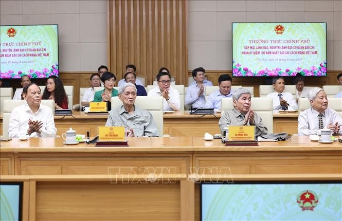 Nguyên lãnh đạo các cơ quan báo chí tham dự buổi gặp. Ảnh: Dương Giang/TTXVN.