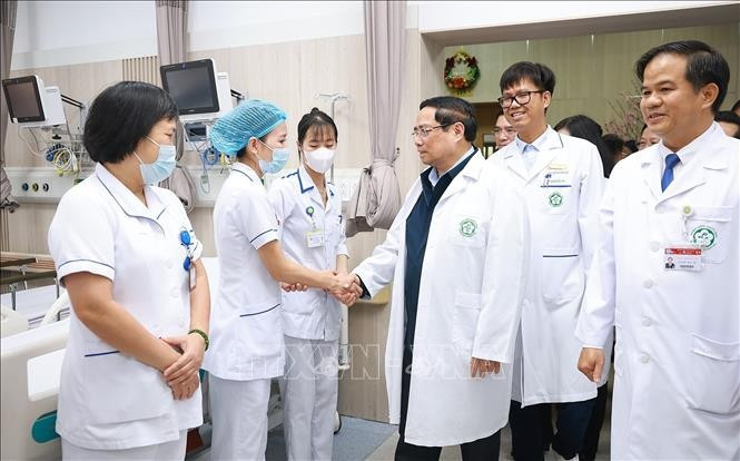 Thủ tướng Phạm Minh Chính thăm, chúc Tết các y sĩ, bác sĩ Bệnh viện Bạch Mai. Ảnh: Dương Giang/TTXVN Thủ tướng Phạm Minh Chính thăm, chúc Tết các y sĩ, bác sĩ Bệnh viện Bạch Mai. Ảnh: Dương Giang/TTXVN