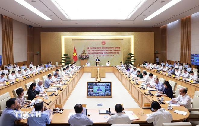 Thủ tướng Phạm Minh Chính chủ trì Hội nghị Chính phủ với địa phương về kịch bản tăng trưởng kinh tế năm 2025. (Ảnh: Dương Giang/TTXVN)